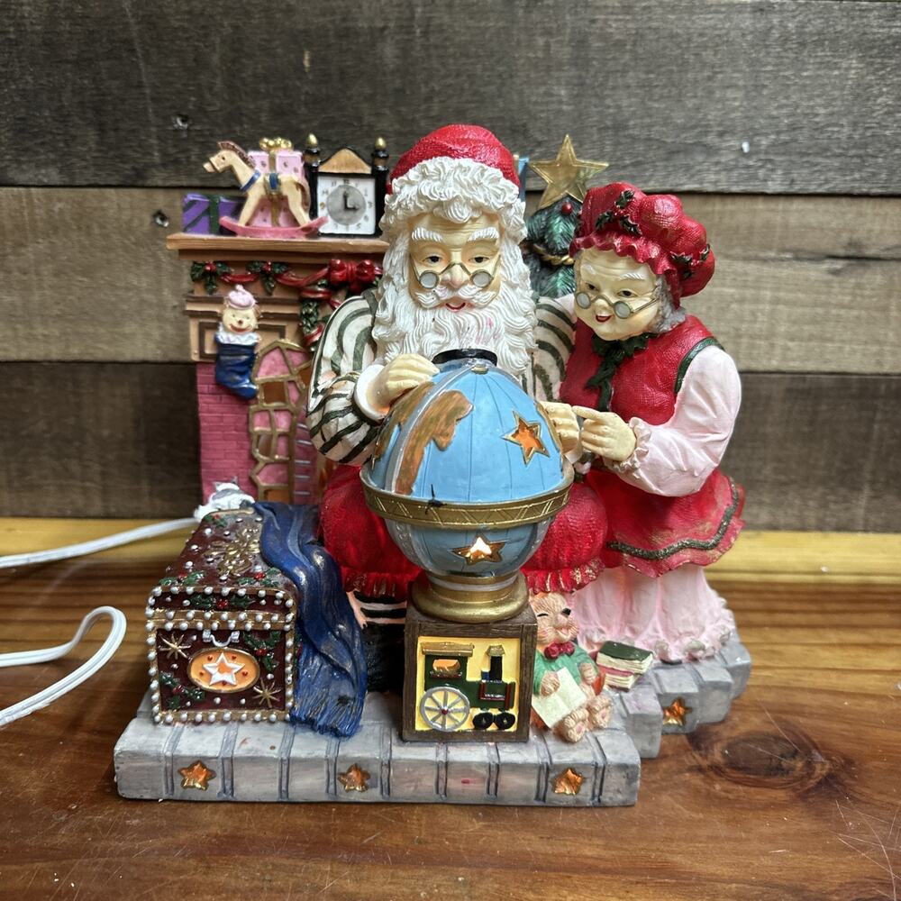 Grandeur Noel Santa Mrs Claus Fireplace Globe Lighted in Box - Flaw